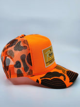 Load image into Gallery viewer, Neon Orange Camo with Gold Patch - 5 Panel High Crown RS Trucker Hat
