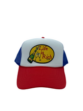 Load image into Gallery viewer, Red,White,&amp; Blue with Celebration Logo- 5 Panel High Crown Trucker Hat
