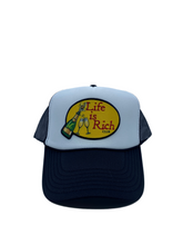 Load image into Gallery viewer, Black &amp; White with Celebration Patch - 5 Panel High Crown Trucker Hat
