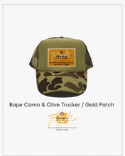 Load image into Gallery viewer, Bape Camo &amp; Olive Green with Gold Patch - 5 Panel High Crown RS Truscker Hat
